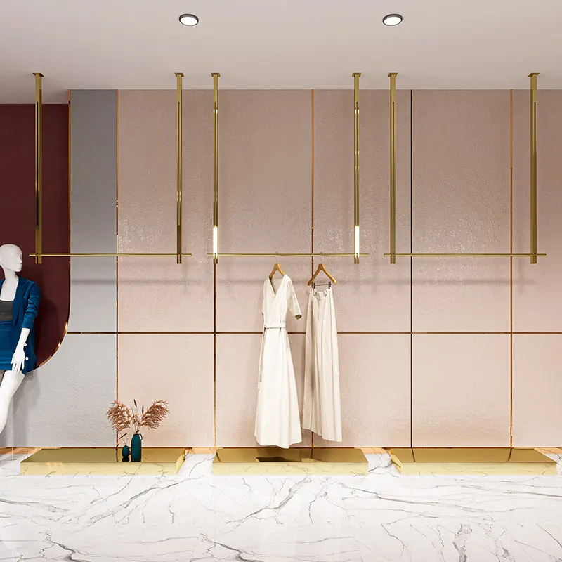 Clothing store display shelves, wall ceiling hanging stainless steel titanium hanging clothes display shelves, men's and women's
Clothing store display shelves, wall ceiling hanging stainless steel titanium hanging clothes display shelves, men's and women's