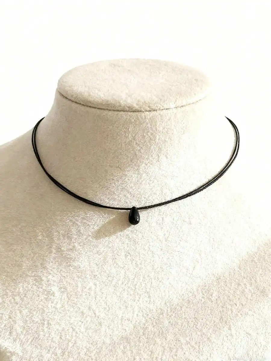 Black Cord Choker Necklace With Single Teardrop Stone
Black Cord Choker Necklace With Single Teardrop Stone