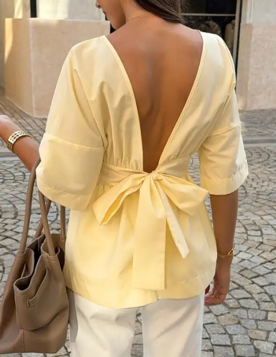 Women's Top 2026 Spring and Summer Romantic Backless Lace Up Loose Shirt Top Simple Fashionable Sexy and Elegant Top
Women's Top 2026 Spring and Summer Romantic Backless Lace Up Loose Shirt Top Simple Fashionable Sexy and Elegant Top