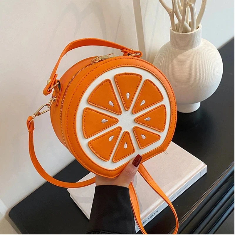 Милые сумки с лимоном для женщин, новинка 2025 года, трендовая сумка через плечо с фруктами из мультфильма, модная роскошная круглая сумка высокого качества, женская вечерняя сумочка
Милые сумки с лимоном для женщин, новинка 2025 года, трендовая сумка через плечо с фруктами из мультфильма, модная роскошная круглая сумка высокого качества, женская вечерняя сумочка