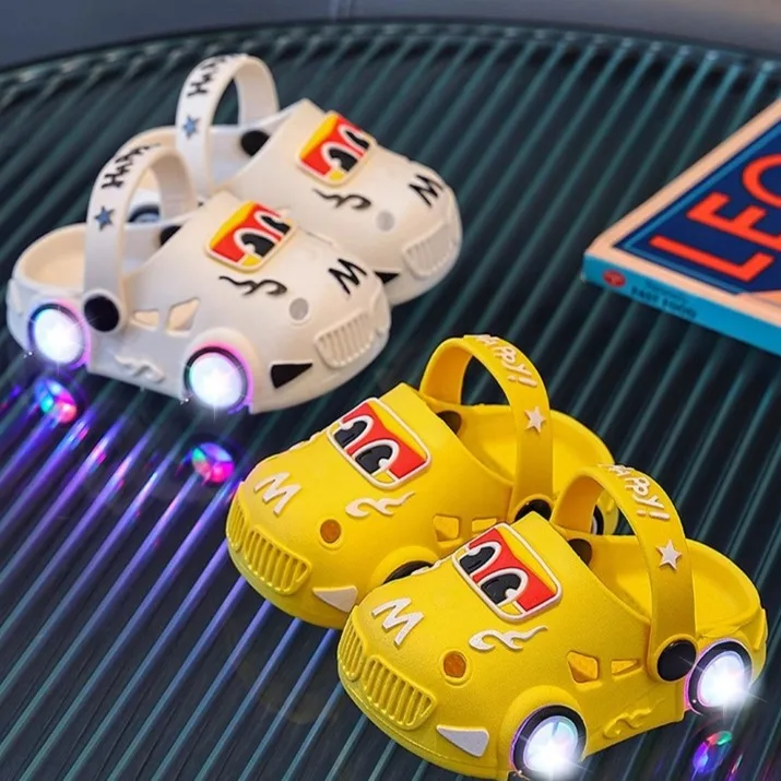 Children's Illuminated Slippers Indoor Anti-Slip Glowing Summer oes for Boys And Girls PVC Material Car Hole Design
Children's Illuminated Slippers Indoor Anti-Slip Glowing Summer oes for Boys And Girls PVC Material Car Hole Design