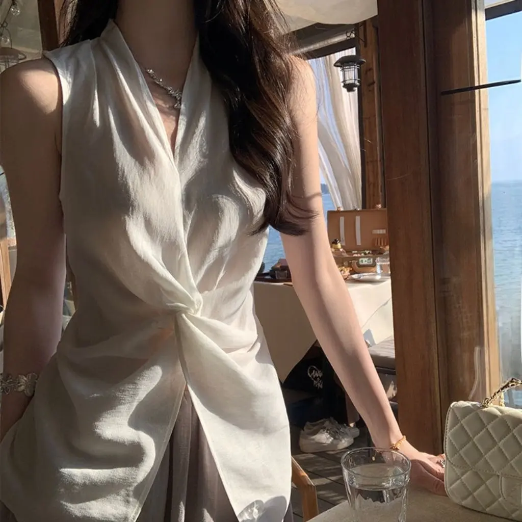 Женская жилетка без рукавов с v-образным вырезом и узлом, облегающая высококачественная модная верхняя одежда, летний топ
Женская жилетка без рукавов с v-образным вырезом и узлом, облегающая высококачественная модная верхняя одежда, летний топ