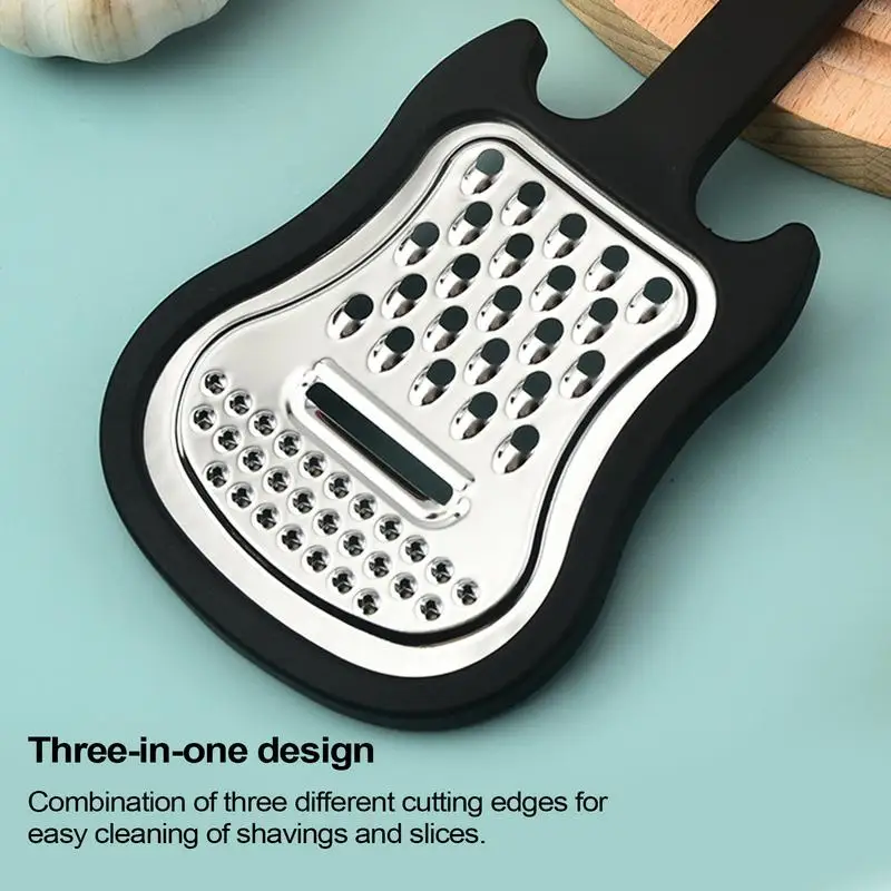 Handheld Fruit Grater Stainless Guitar Shape Metal Cheese Grater Comfortable Grip Kitchen Grater Fruit Pulp Crusher For Citrus
Handheld Fruit Grater Stainless Guitar Shape Metal Cheese Grater Comfortable Grip Kitchen Grater Fruit Pulp Crusher For Citrus