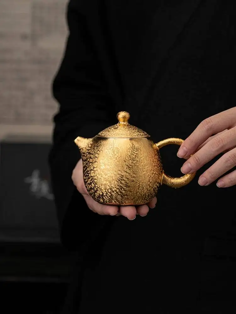 Famous Artist's Handmade 24K Gold-Plated Jianzhan Teapot, Household Dragon Egg Pot, Vintage Pure Kung Fu Tea Set, Cup, Gold Pot
Famous Artist's Handmade 24K Gold-Plated Jianzhan Teapot, Household Dragon Egg Pot, Vintage Pure Kung Fu Tea Set, Cup, Gold Pot