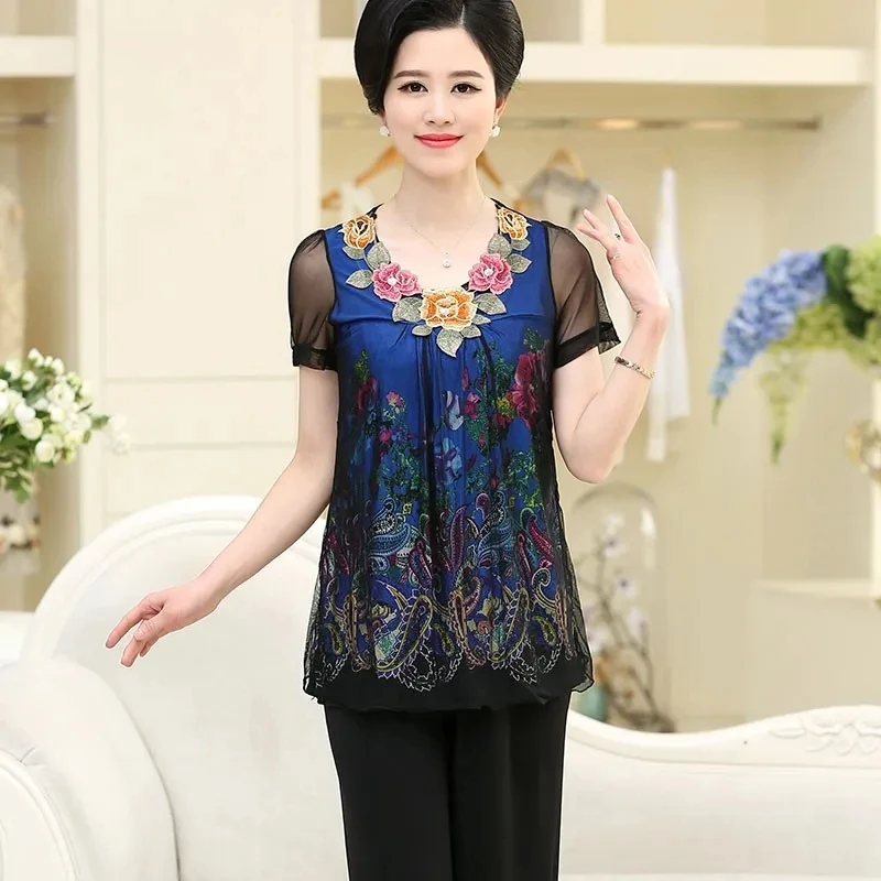 Middle-aged and elderly women's summer suits large size short-sleeved t-shirt + pants suit loose two-piece set A878
Middle-aged and elderly women's summer suits large size short-sleeved t-shirt + pants suit loose two-piece set A878