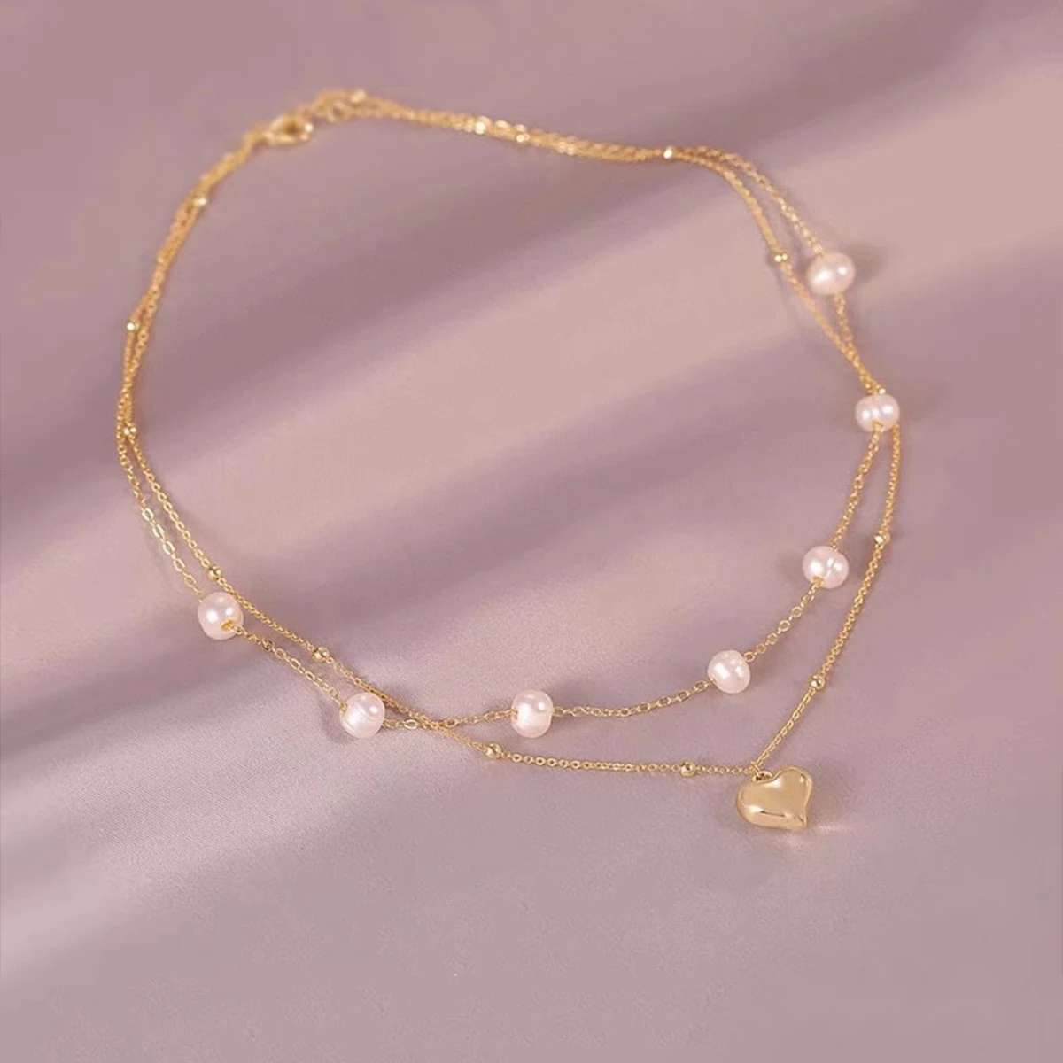 Solid silver S925 women's jewelry ins pearl surround heart-shaped necklace girlfriend birthday gift selection
Solid silver S925 women's jewelry ins pearl surround heart-shaped necklace girlfriend birthday gift selection
