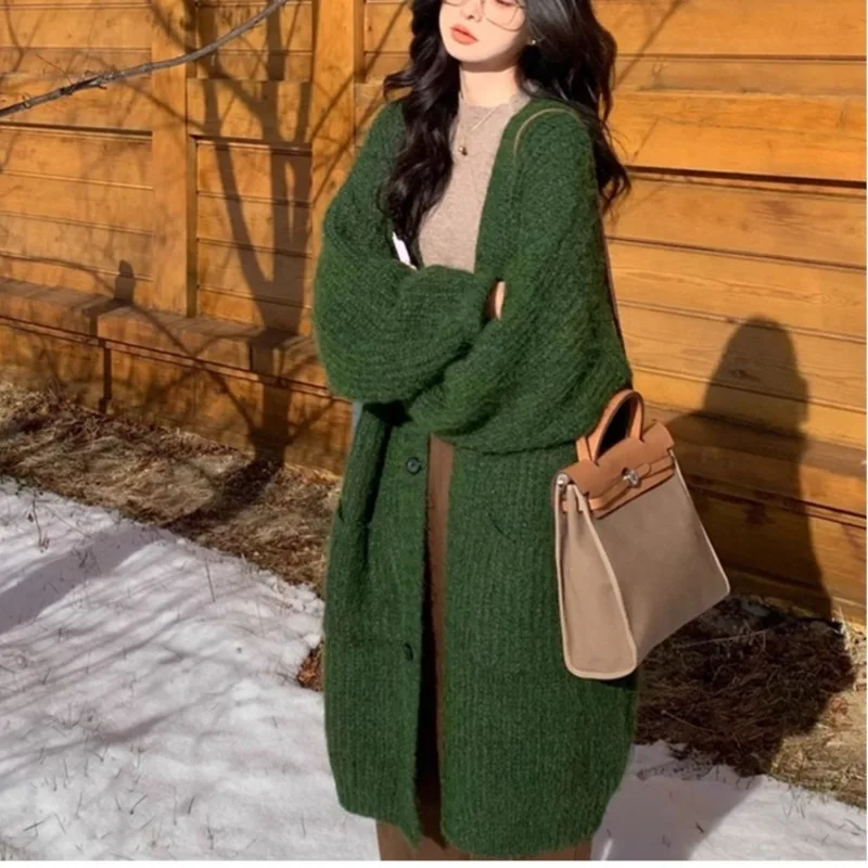 Woman's sweater cardigan autumn/winter loose knitted lantern sleeve solid color female clothing E1437
Woman's sweater cardigan autumn/winter loose knitted lantern sleeve solid color female clothing E1437