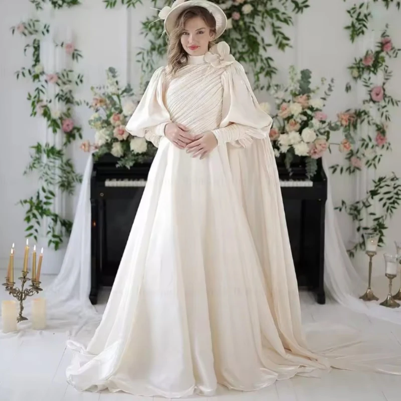 Muslim Wedding Dresses High Neck Puff Sleeve Brides Dress with Cape Pleat Flower A-Line Bridal Gown Customized robe de mariée 
Muslim Wedding Dresses High Neck Puff Sleeve Brides Dress with Cape Pleat Flower A-Line Bridal Gown Customized robe de mariée