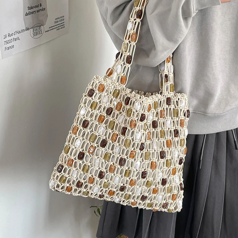 2026 New Women's Plaid Woven Handbag Luxury Hollow Out Lattice Bag Wooden Beaded Tote Bag Casual Beach Vacation Crossbody Purse
2026 New Women's Plaid Woven Handbag Luxury Hollow Out Lattice Bag Wooden Beaded Tote Bag Casual Beach Vacation Crossbody Purse