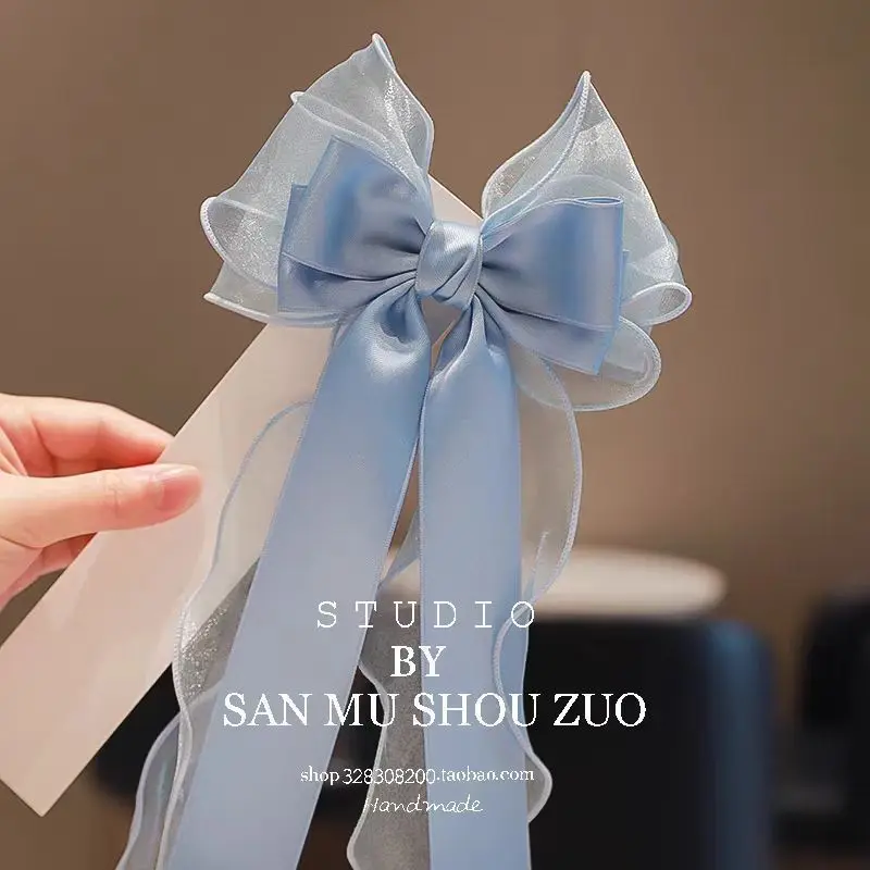 Cute big bow long ribbon hair clip princess ponytail girl solid color ribbon hair accessory
Cute big bow long ribbon hair clip princess ponytail girl solid color ribbon hair accessory