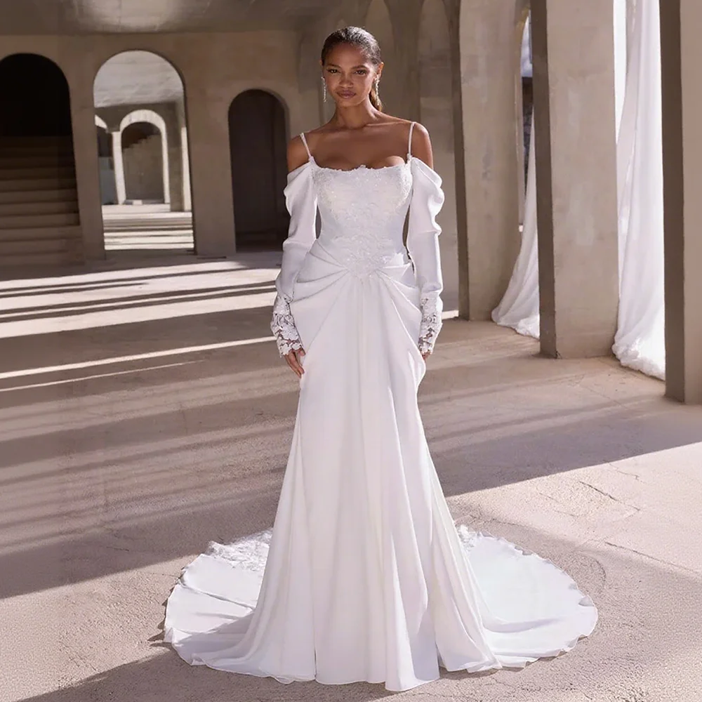 Customized Satin Wedding Dress with Spaghetti Straps Angel Wing Neckline Detachable Long Sleeves Back Button Detail Sweep Train 
Customized Satin Wedding Dress with Spaghetti Straps Angel Wing Neckline Detachable Long Sleeves Back Button Detail Sweep Train