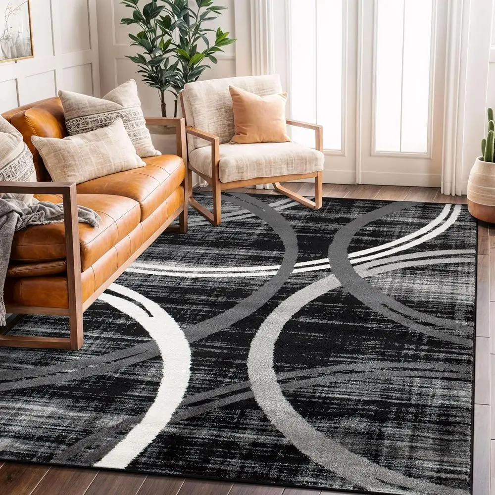 Contemporary Ripple Circle Rug with Jute Base for Living Spaces, 5'3 x 7'3, Black
Contemporary Ripple Circle Rug with Jute Base for Living Spaces, 5'3 x 7'3, Black