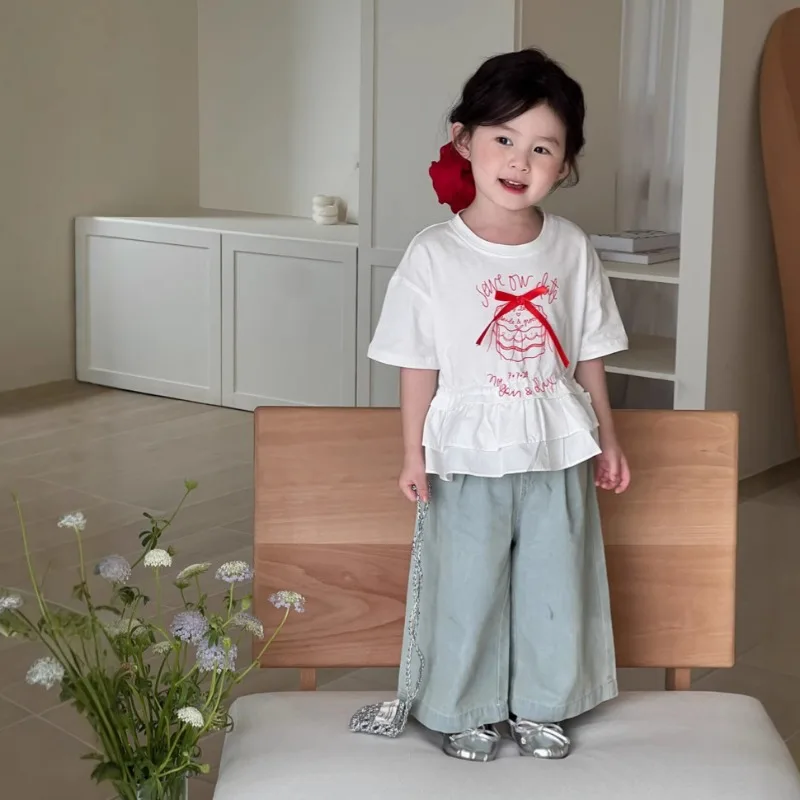 2025 Summer New Product Girls' Korean Version with Ruffled Hem T-shirt, Short Sleeved Children's Butterfly Knot Sweet Top
2025 Summer New Product Girls' Korean Version with Ruffled Hem T-shirt, Short Sleeved Children's Butterfly Knot Sweet Top