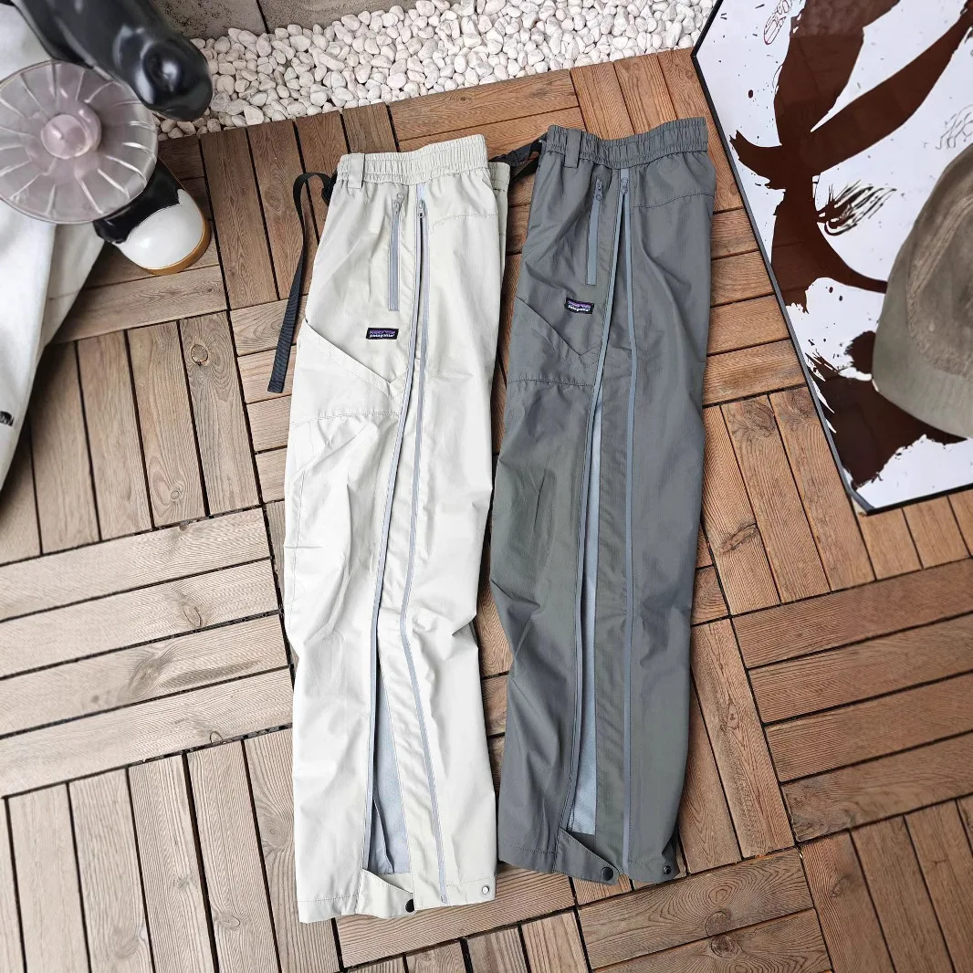 Outdoor hard shell pants side zipper mountaineering waterproof and windproof hiking trousers
Outdoor hard shell pants side zipper mountaineering waterproof and windproof hiking trousers