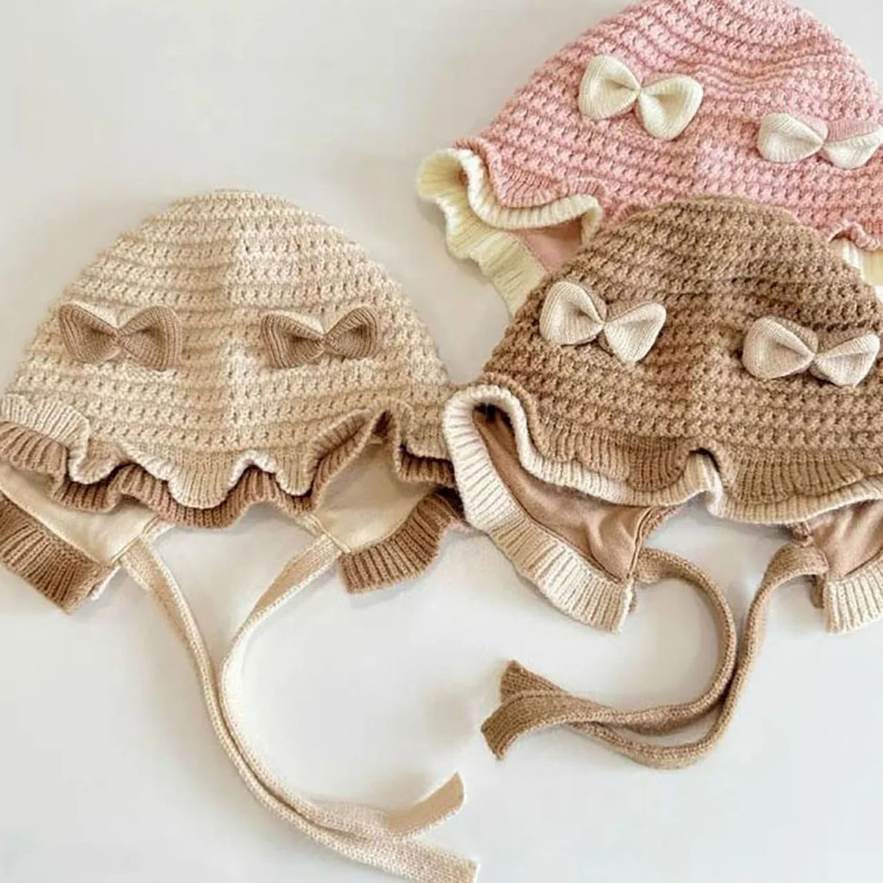 Зимняя детская шапка для защиты ушей, милая шапка с бантом и рюшами, ветрозащитная теплая шапка для малышей от 3 до 15 месяцев, детские вязаные головные уборы, шапки 
Зимняя детская шапка для защиты ушей, милая шапка с бантом и рюшами, ветрозащитная теплая шапка для малышей от 3 до 15 месяцев, детские вязаные головные уборы, шапки