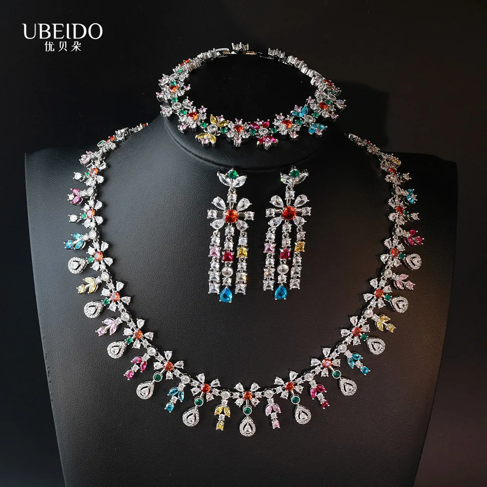 Women Rainbow Crown Teardrop Gem Necklace with Colorful Diamond Floral Tassel Earrings
Women Rainbow Crown Teardrop Gem Necklace with Colorful Diamond Floral Tassel Earrings