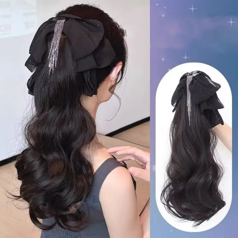 Ponytail wig for women with tassels bow clip, European and American style, large wavy curls
Ponytail wig for women with tassels bow clip, European and American style, large wavy curls