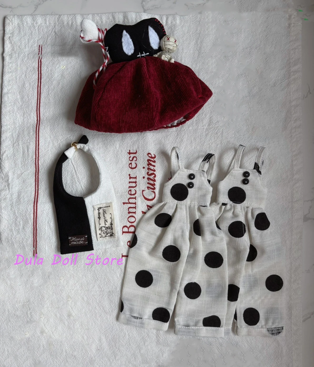 Комплект одежды для куклы 2026 Dula: комбинезон в черно-белую горошек с красной шляпой для Blythe ob24 ob22 ICY JerryB 1/6, аксессуары для кукол
Комплект одежды для куклы 2026 Dula: комбинезон в черно-белую горошек с красной шляпой для Blythe ob24 ob22 ICY JerryB 1/6, аксессуары для кукол