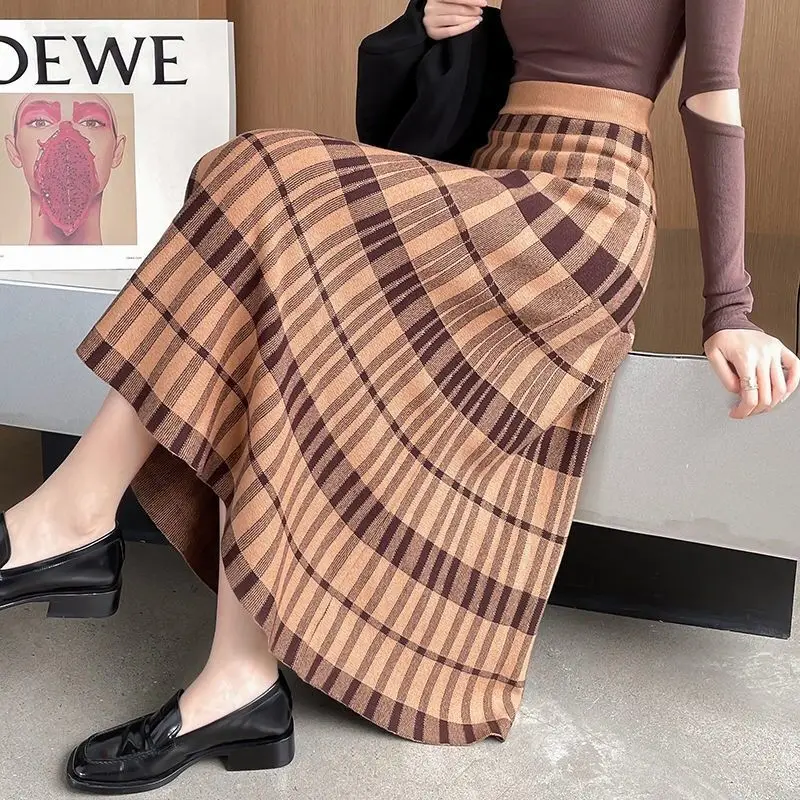 Autumn and winter skirt female high -end plaid knitted skirt mid -length high waist thin skirt wool character long skirt female
Autumn and winter skirt female high -end plaid knitted skirt mid -length high waist thin skirt wool character long skirt female