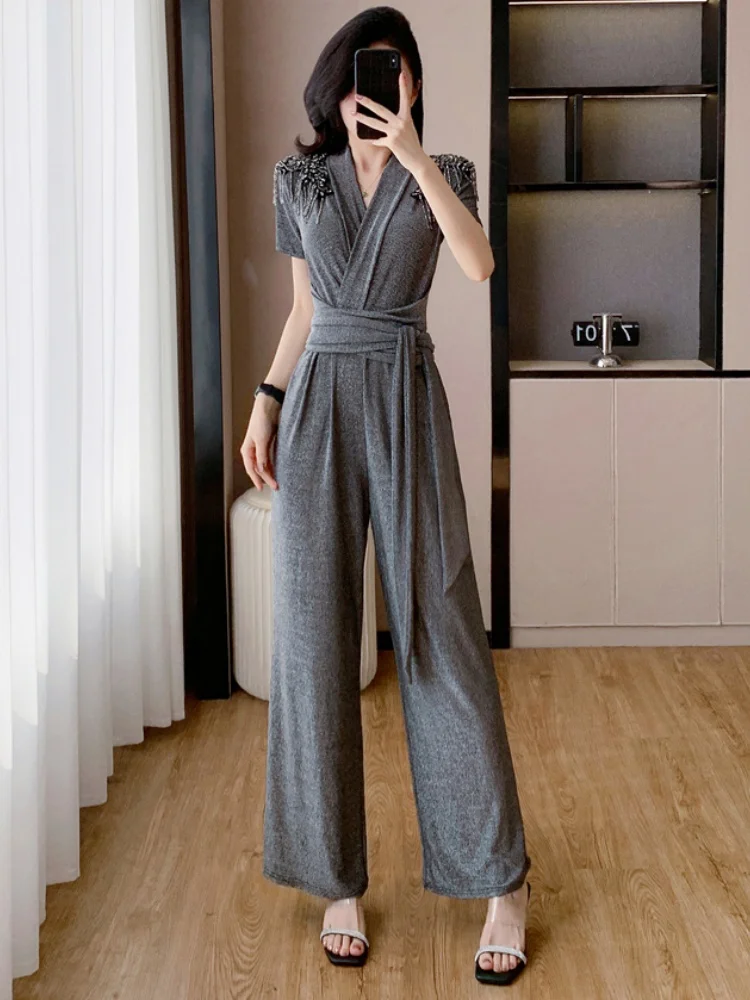 SMTHMA Summer New Fashion Sexy V-Neck Lace Up Luxury Bead Jumpsuit Women's High-End Temperament Elegant Jumpsuit
SMTHMA Summer New Fashion Sexy V-Neck Lace Up Luxury Bead Jumpsuit Women's High-End Temperament Elegant Jumpsuit