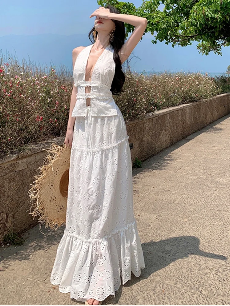 New Fashion Girls' Two-Piece Set Hanging Neck Sexy Backless Top Women's Elastic High Waist Embroidery Hollow Out Long Skirt Suit
New Fashion Girls' Two-Piece Set Hanging Neck Sexy Backless Top Women's Elastic High Waist Embroidery Hollow Out Long Skirt Suit