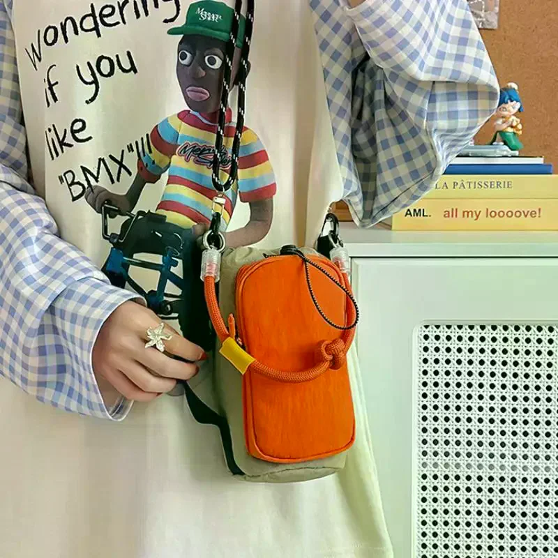 Multipurpose Mini Crossbody Bag Women Nylon with Color Block Drawstring Design
Multipurpose Mini Crossbody Bag Women Nylon with Color Block Drawstring Design