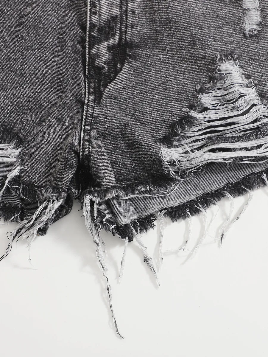 Ripped Denim Shorts With Frayed Hem
Ripped Denim Shorts With Frayed Hem