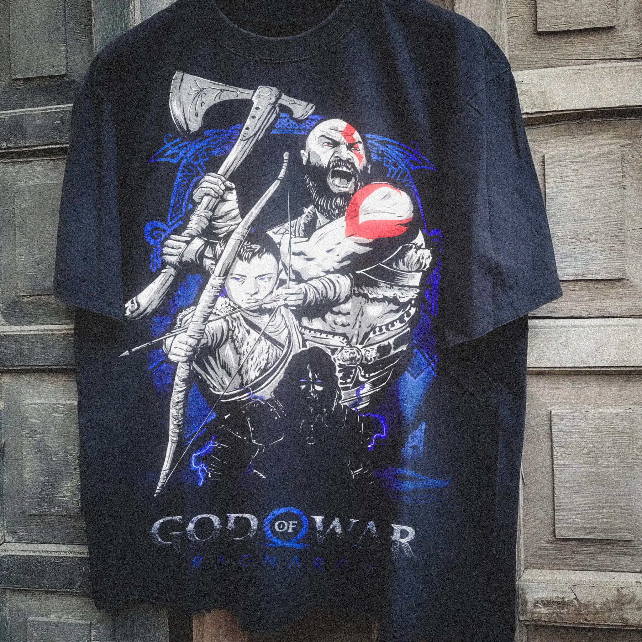 God of War Ragnarok T-Shirt Kratos and Atreus Graphic Print Unisex Heavy Wash High-Weight Cotton Perfect Gift for Gaming Fans. 
God of War Ragnarok T-Shirt Kratos and Atreus Graphic Print Unisex Heavy Wash High-Weight Cotton Perfect Gift for Gaming Fans.
