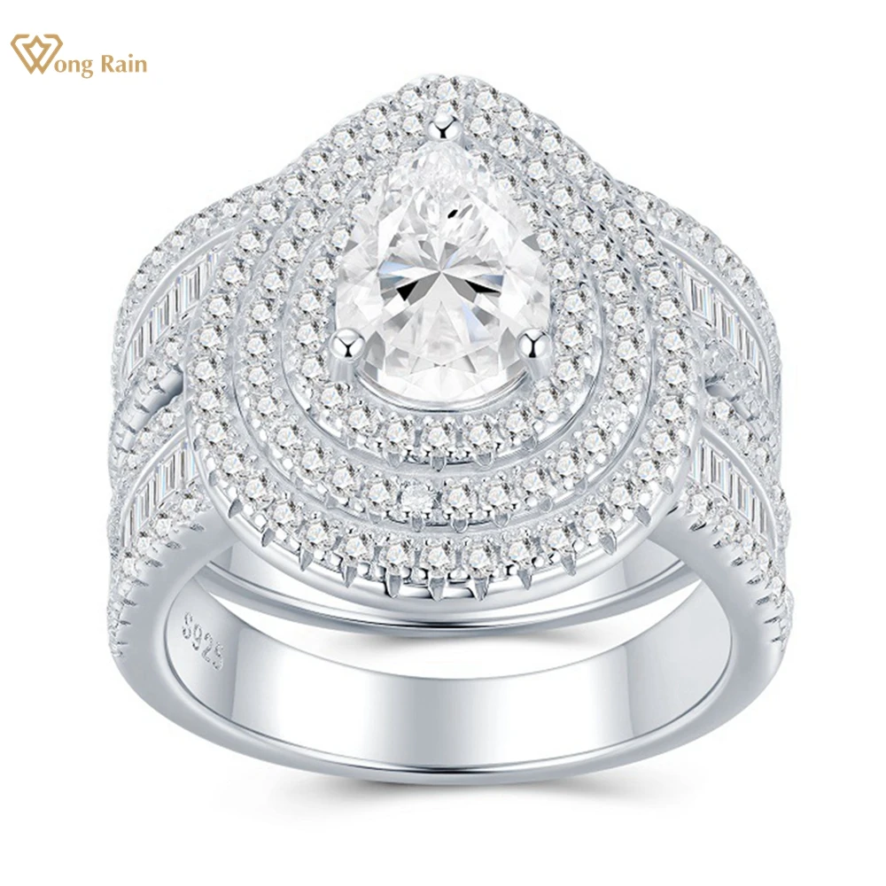 Wong Rain Сверкающее серебро 925 пробы 3EX VVS1 D Цвет грушевидной огранки Настоящий муассанит с бриллиантами и драгоценными камнями Наборы обручальных колец Изысканные ювелирные изделия
Wong Rain Сверкающее серебро 925 пробы 3EX VVS1 D Цвет грушевидной огранки Настоящий муассанит с бриллиантами и драгоценными камнями Наборы обручальных колец Изысканные ювелирные изделия