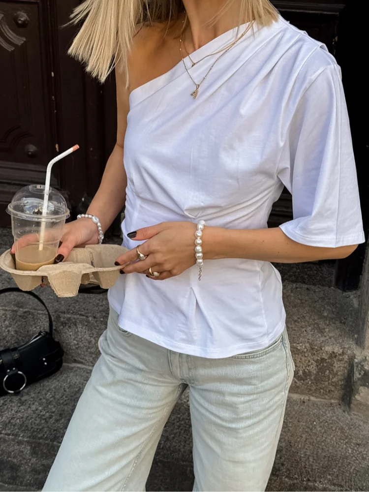 Women's White One Shoulder Asymmetric Blouse Elegant Ruched Bust Minimalist Sleeve Tops 2026 summer Fashion Date Night T-shirt
Women's White One Shoulder Asymmetric Blouse Elegant Ruched Bust Minimalist Sleeve Tops 2026 summer Fashion Date Night T-shirt