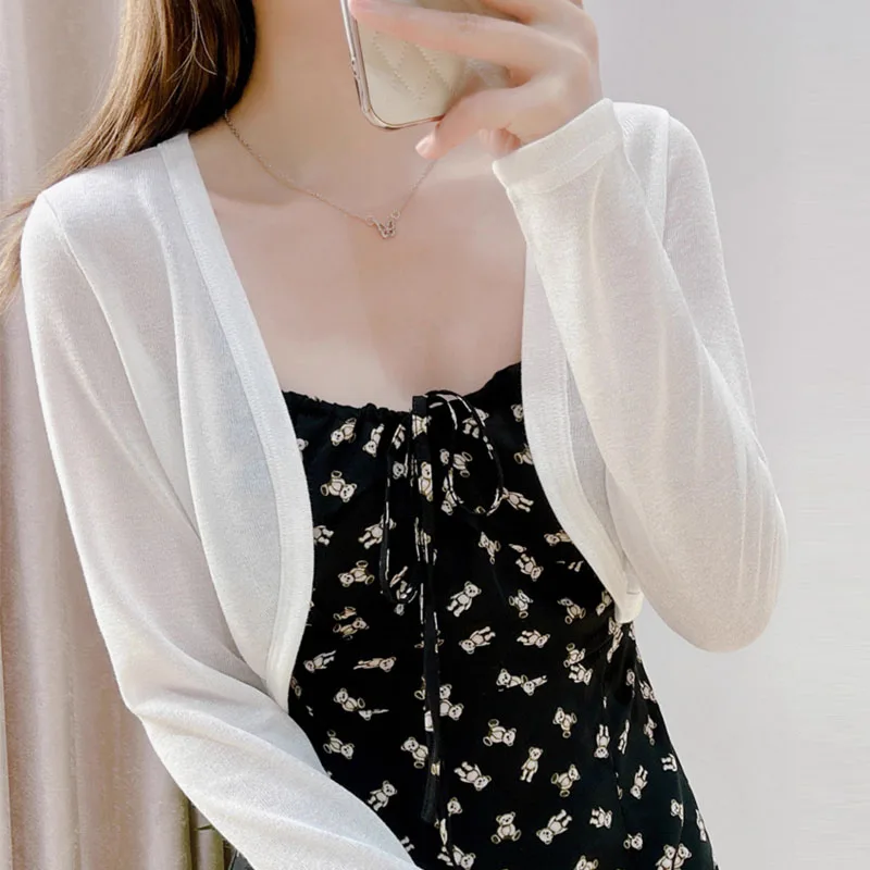 Sweaters Knitted Sweater Women Cardigans Summer New White Long Sleeve Knit Sweater Cardigan Women Tops Sunscreen Knitwears Q3933
Sweaters Knitted Sweater Women Cardigans Summer New White Long Sleeve Knit Sweater Cardigan Women Tops Sunscreen Knitwears Q3933