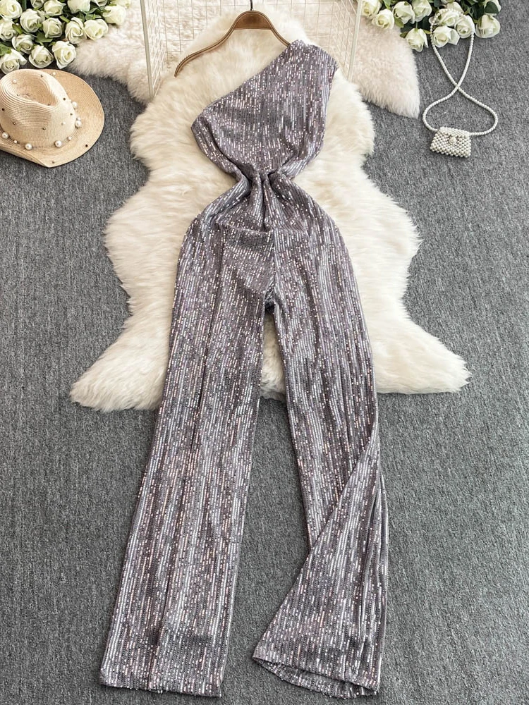 Женский комбинезон с пайетками, модный, с асимметричным вырезом на плече, утягивающий, с высокой талией, для офиса, широкие длинные брюки
Женский комбинезон с пайетками, модный, с асимметричным вырезом на плече, утягивающий, с высокой талией, для офиса, широкие длинные брюки