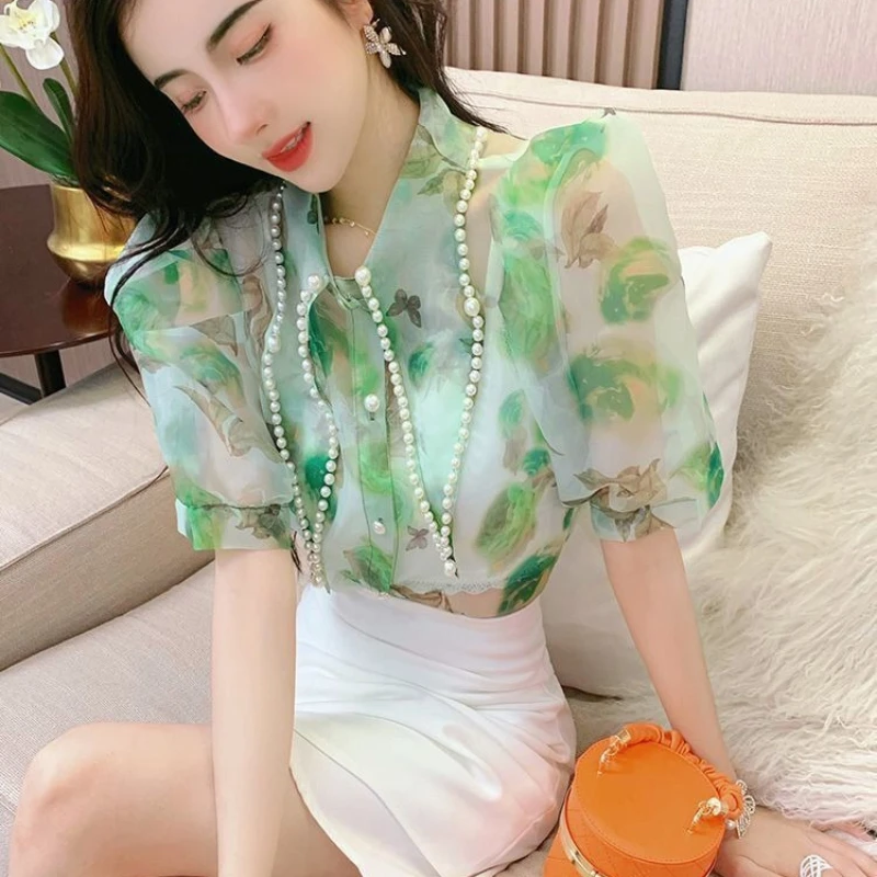 Printed Inspired Style Women's Short Sleeve Shirt 2026 Summer New Arrival Niche Design Sense Pointed Collar Heavy Duty Beaded
Printed Inspired Style Women's Short Sleeve Shirt 2026 Summer New Arrival Niche Design Sense Pointed Collar Heavy Duty Beaded