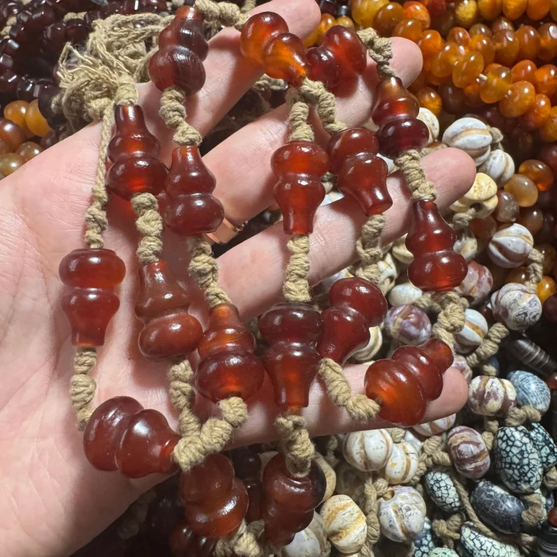 Natural burgundy , gourd , aged agate , old bead necklace
Natural burgundy , gourd , aged agate , old bead necklace
