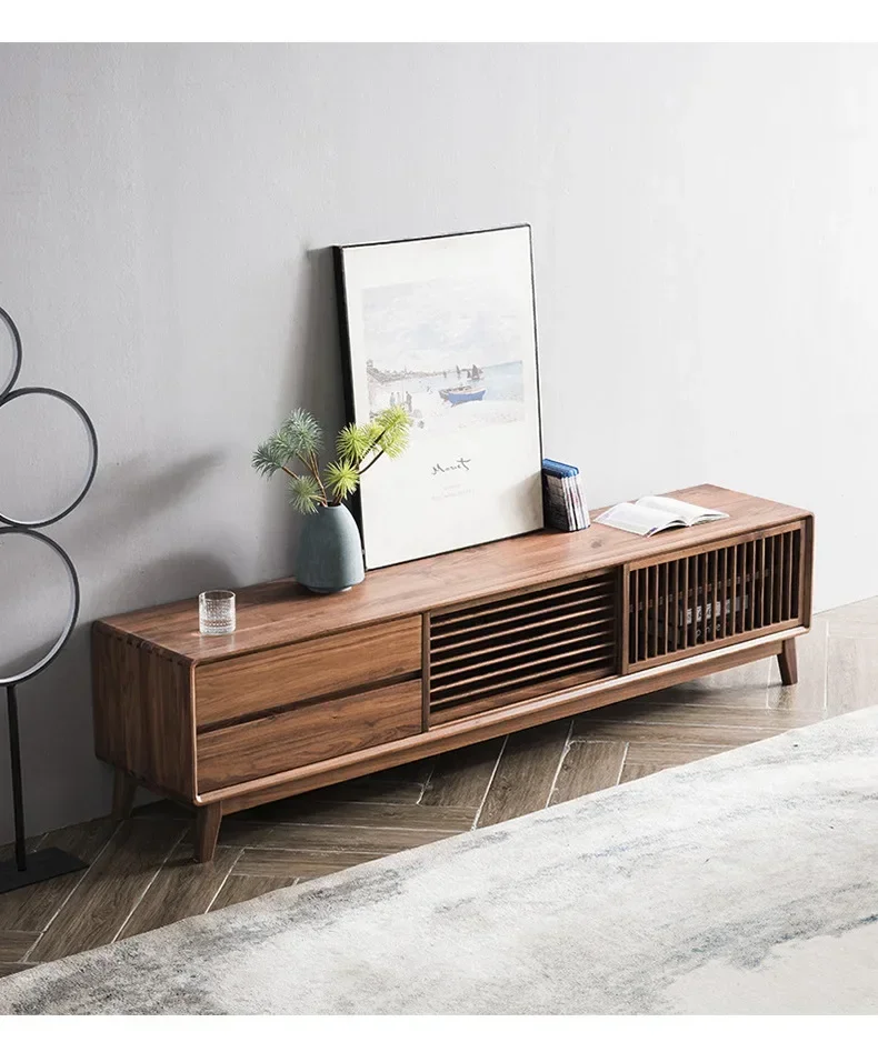 A Nordic living room solid wood TV cabinet small apartment living room black walnut storage cabinet
A Nordic living room solid wood TV cabinet small apartment living room black walnut storage cabinet