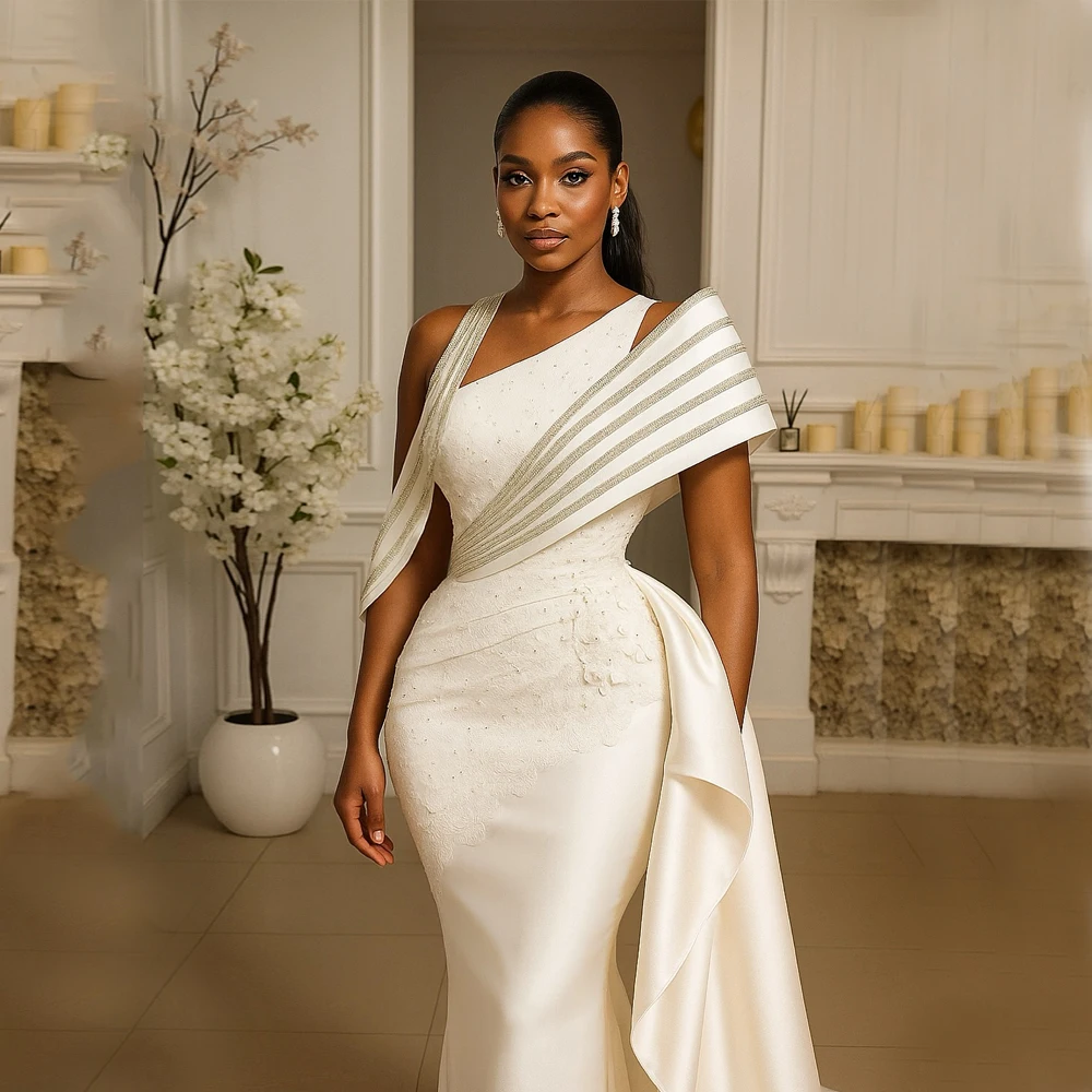 African Mermaid Wedding Dresses 2025 Lace Flowers Floor Length Pearls Ivory Vestidos De Fiesta Customized Elegant Bride Gowns 
African Mermaid Wedding Dresses 2025 Lace Flowers Floor Length Pearls Ivory Vestidos De Fiesta Customized Elegant Bride Gowns