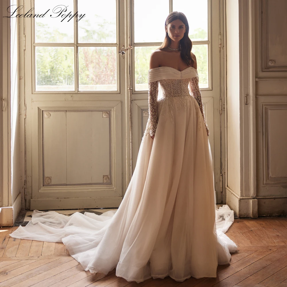 Lceland Poppy A Line Boat Neck Beaded Lace Wedding Dresses Full Sleeves Glitter Tulle Bridal Gowns with Court Train
Lceland Poppy A Line Boat Neck Beaded Lace Wedding Dresses Full Sleeves Glitter Tulle Bridal Gowns with Court Train