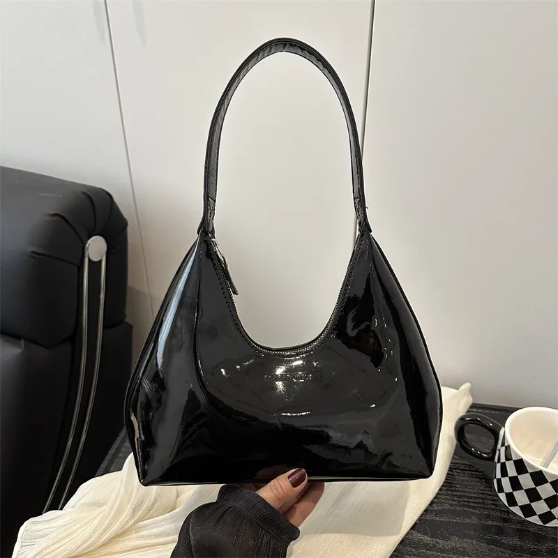 Шикарная и повседневная ниша 2025, новая модная женская сумка в форме полумесяца, плечо, портативная и подмышки
Шикарная и повседневная ниша 2025, новая модная женская сумка в форме полумесяца, плечо, портативная и подмышки