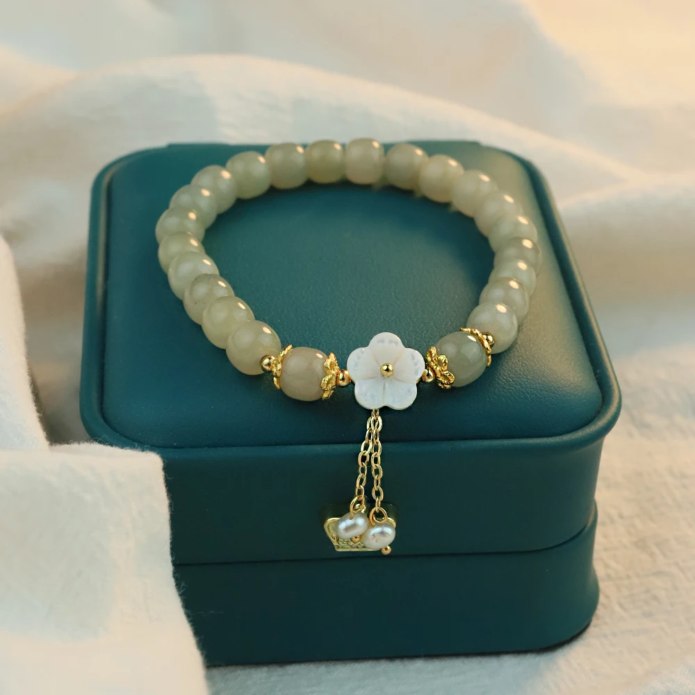 Handmade Shell Flower Green Jade Pearl Bracelet - Stretchy Beaded Chain with Long Tassel, Vintage Style Adjustable Wristlet Gift
Handmade Shell Flower Green Jade Pearl Bracelet - Stretchy Beaded Chain with Long Tassel, Vintage Style Adjustable Wristlet Gift