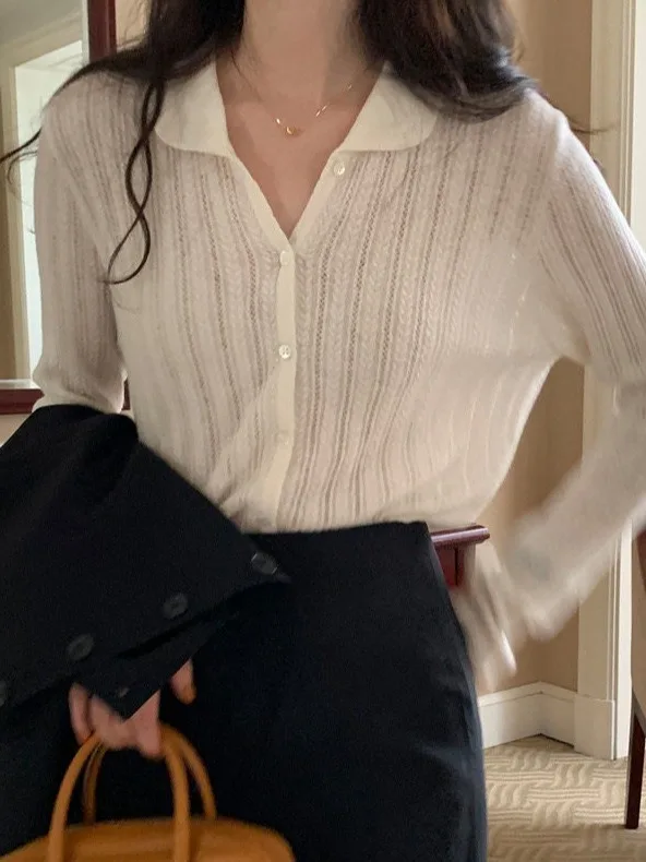 White Knitted Hollow out Cardigan Women's Spring 2026 New Design Casual Loose Fit Long Sleeve Short Coat Casual Style
White Knitted Hollow out Cardigan Women's Spring 2026 New Design Casual Loose Fit Long Sleeve Short Coat Casual Style