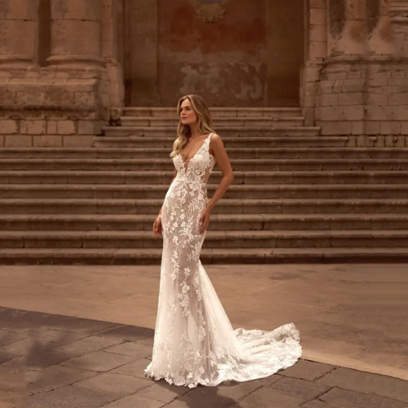 Exquisite Lace Appliques Mermaid Wedding Dress Spaghetti Straps Sexy Deep V-Neck Backless Sweep Train Bridal Dress Customized
Exquisite Lace Appliques Mermaid Wedding Dress Spaghetti Straps Sexy Deep V-Neck Backless Sweep Train Bridal Dress Customized