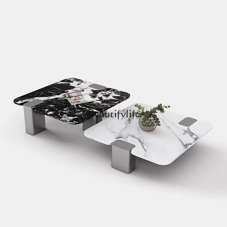 Italian minimalist marble coffee table high-end artistic square high and low combination coffee table
Italian minimalist marble coffee table high-end artistic square high and low combination coffee table