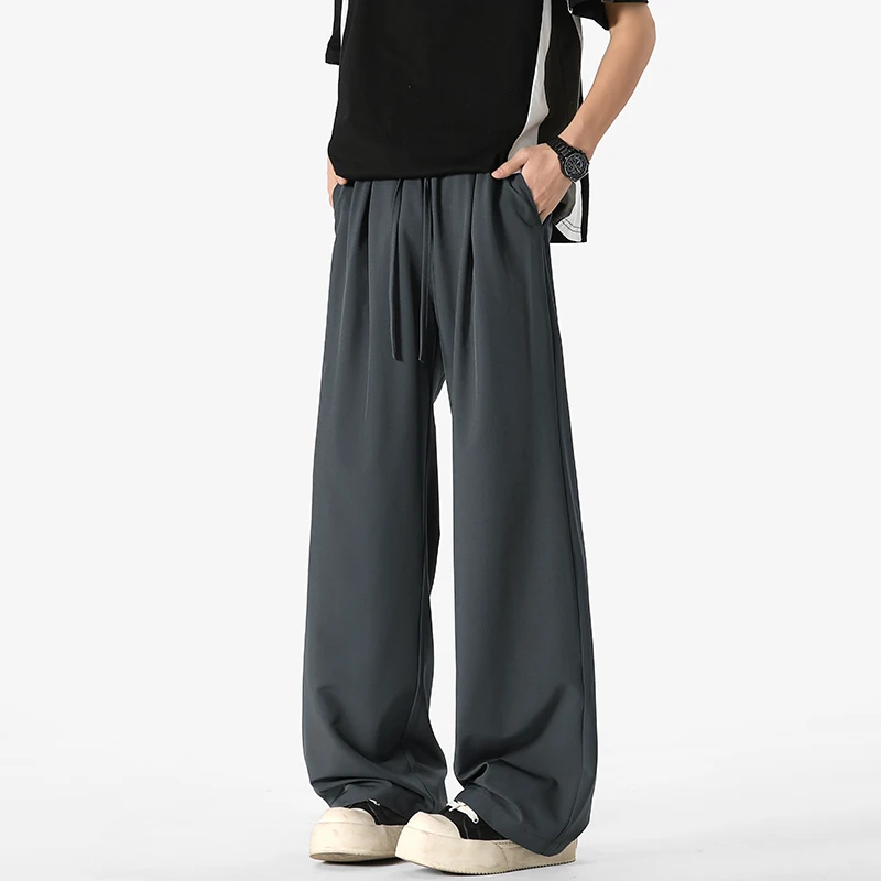 Новые летние брюки из ледяного шелка, прямые брюки с эластичной резинкой на талии, дышащие простые мужские повседневные брюки свободного покроя с прямыми штанинами и широкими штанинами
Новые летние брюки из ледяного шелка, прямые брюки с эластичной резинкой на талии, дышащие простые мужские повседневные брюки свободного покроя с прямыми штанинами и широкими штанинами