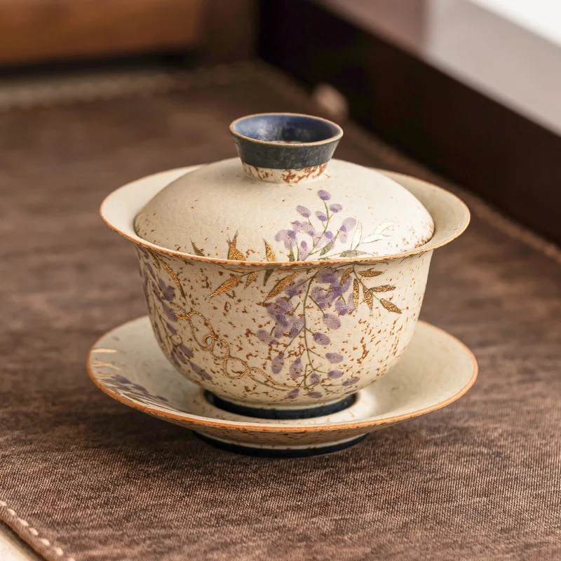 Hand-Painted Gold Wisteria Blue & White San Cai Gaiwan, Fire Clay Red Tea Cup with Lid, Heat-Resistant Smooth Single Tea Bowl
Hand-Painted Gold Wisteria Blue & White San Cai Gaiwan, Fire Clay Red Tea Cup with Lid, Heat-Resistant Smooth Single Tea Bowl