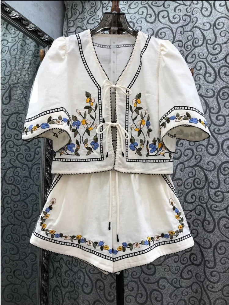 Summer Vacation Style Embroidered V-neck Tied Short Sleeve Top Shorts Set Women's Fashionable Cotton Two-piece Ensemble
Summer Vacation Style Embroidered V-neck Tied Short Sleeve Top Shorts Set Women's Fashionable Cotton Two-piece Ensemble