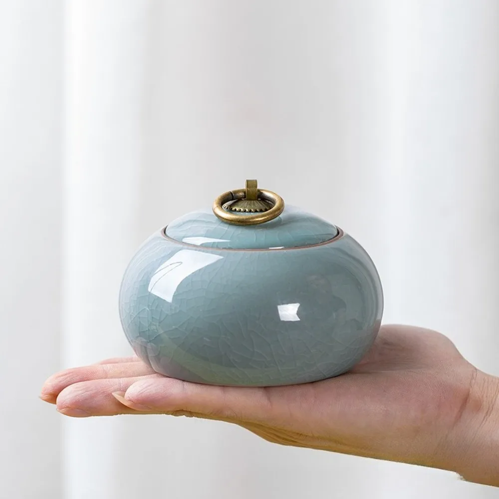 Celadon Ceramic Pet Urn Crackle Glaze Sealed Memorial Jar with Metal Handle Pet Ashes Keepsake Container Portable Pet Products
Celadon Ceramic Pet Urn Crackle Glaze Sealed Memorial Jar with Metal Handle Pet Ashes Keepsake Container Portable Pet Products