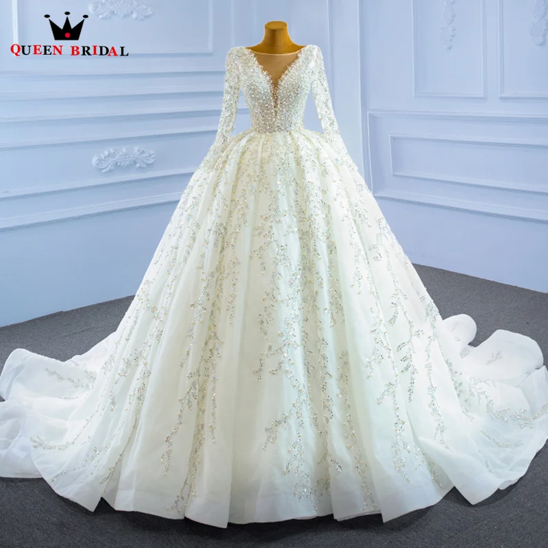 Wedding Dress Luxury V-neck Illusion Long Sleeves Bridal Gown Sequined Pearls Beading Ball Gown Lace Up Custom Made XX22
Wedding Dress Luxury V-neck Illusion Long Sleeves Bridal Gown Sequined Pearls Beading Ball Gown Lace Up Custom Made XX22