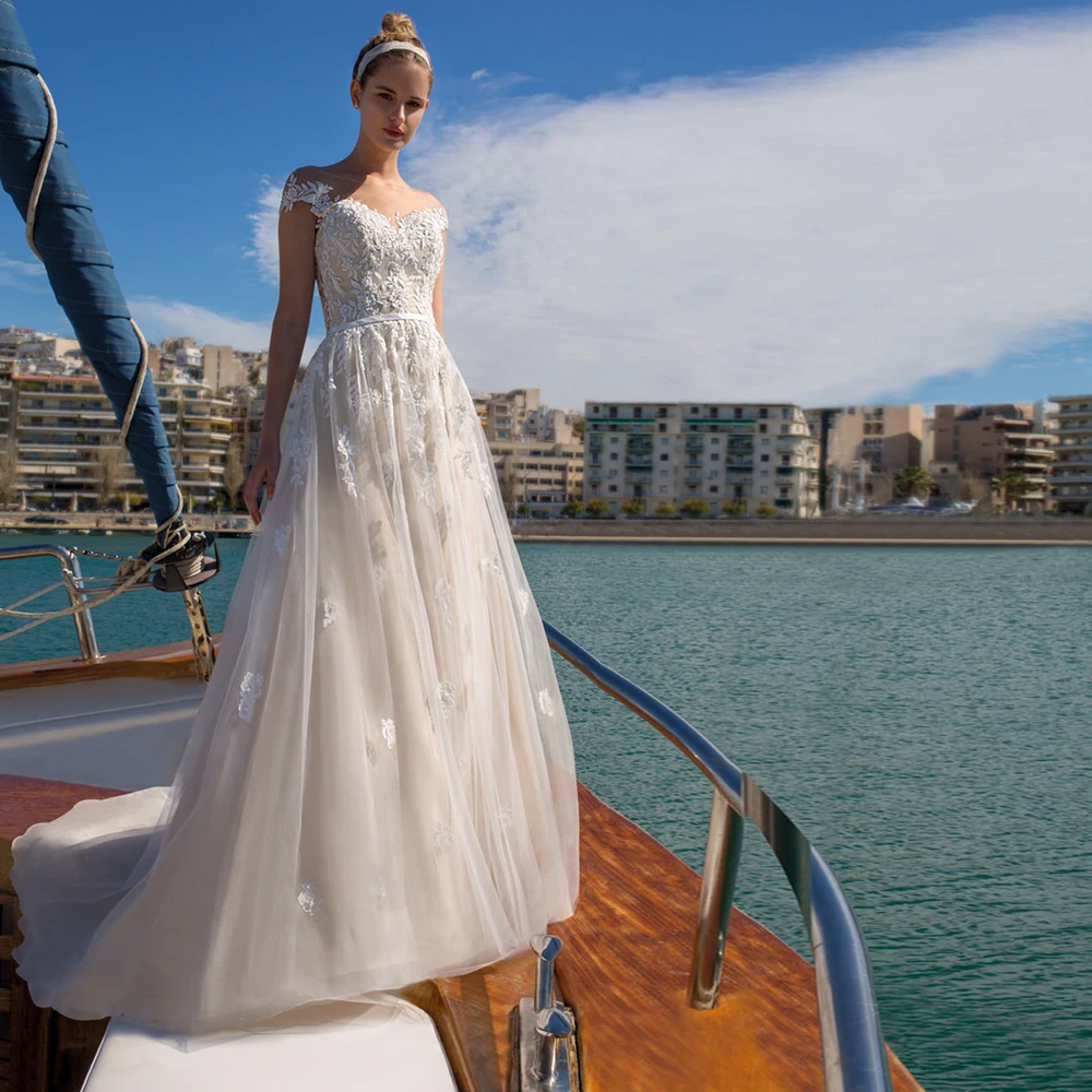 Customized Boat Neck Wedding Dresses Short Sleeves Bridal Growns Applique Lace Open Back Floral Floor Length Vestido de novia
Customized Boat Neck Wedding Dresses Short Sleeves Bridal Growns Applique Lace Open Back Floral Floor Length Vestido de novia