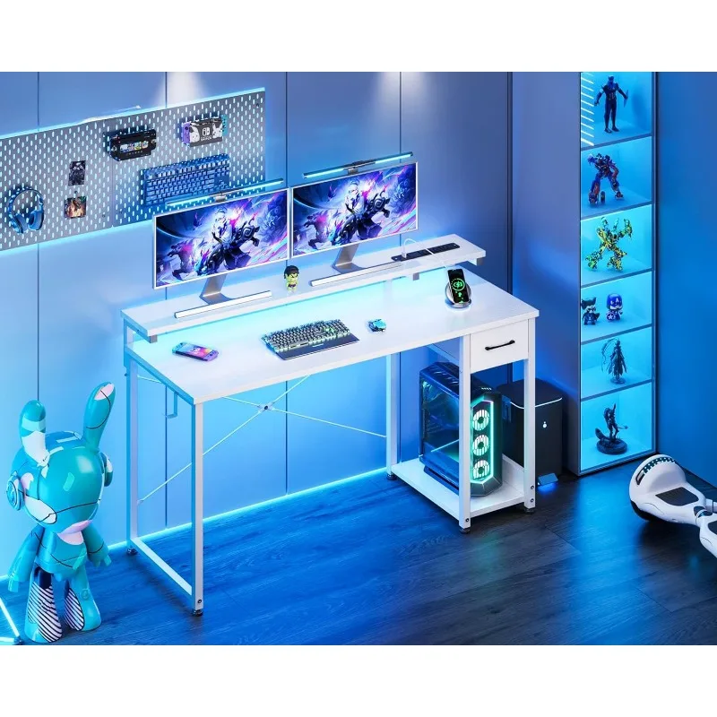Gaming Desk with LED Lights & Power Outlet, 48 Inch Computer Desk with Drawer, Reversible Desk with Adjustable Monitor Shelf
Gaming Desk with LED Lights & Power Outlet, 48 Inch Computer Desk with Drawer, Reversible Desk with Adjustable Monitor Shelf