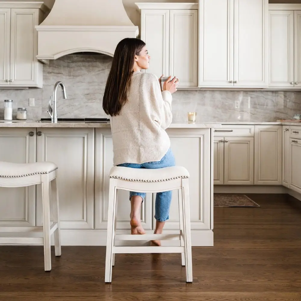 Adrien Backless Counter Stool Set of 4 26 Inches Saddle Stool with Footrest Cream Solid Wood Frame amp Cream Fabric holstery
Adrien Backless Counter Stool Set of 4 26 Inches Saddle Stool with Footrest Cream Solid Wood Frame amp Cream Fabric holstery